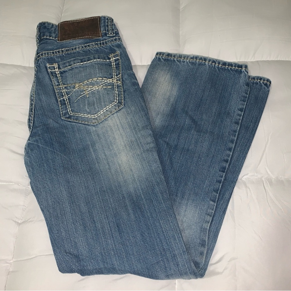 Blue Boot Cut Jeans with Natural Fading